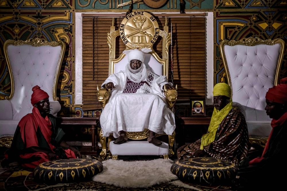Mohammed Abubakar Bambado, the Sarkin Fulani of Lagos, poses for a portrait on his throne in his palace at the district of Surulere in Lagos, Nigeria, on April 29, 2019.  AFP / Luis tato 