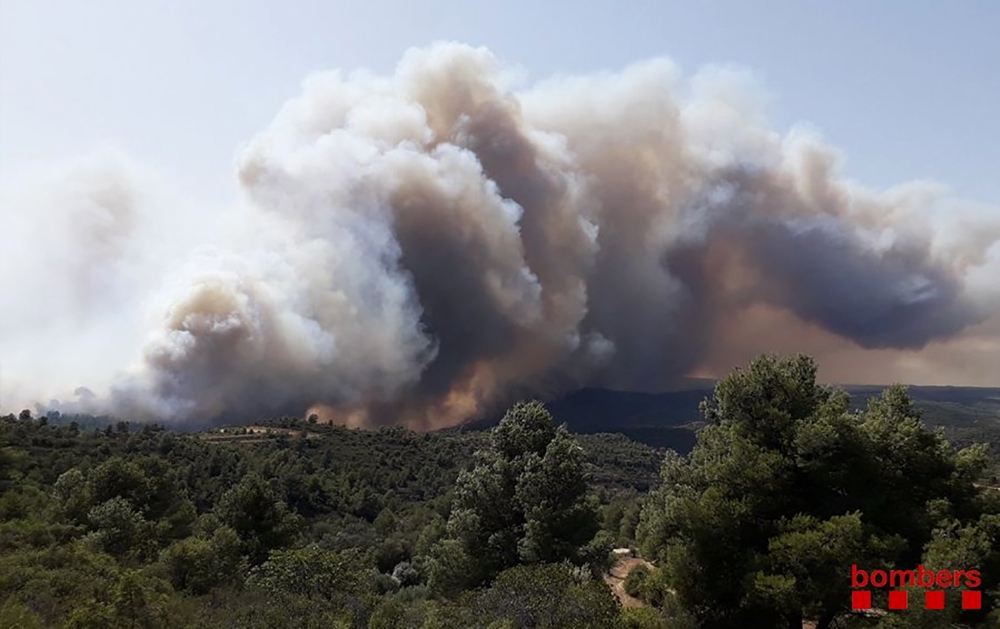 Wildfire at Torre de l´Espanyol in Ribera d´Ebro, on the banks of the river Ebre, northeastern Spain on June 26, 2019. AFP/ Bombers Generalitat Catalunya
