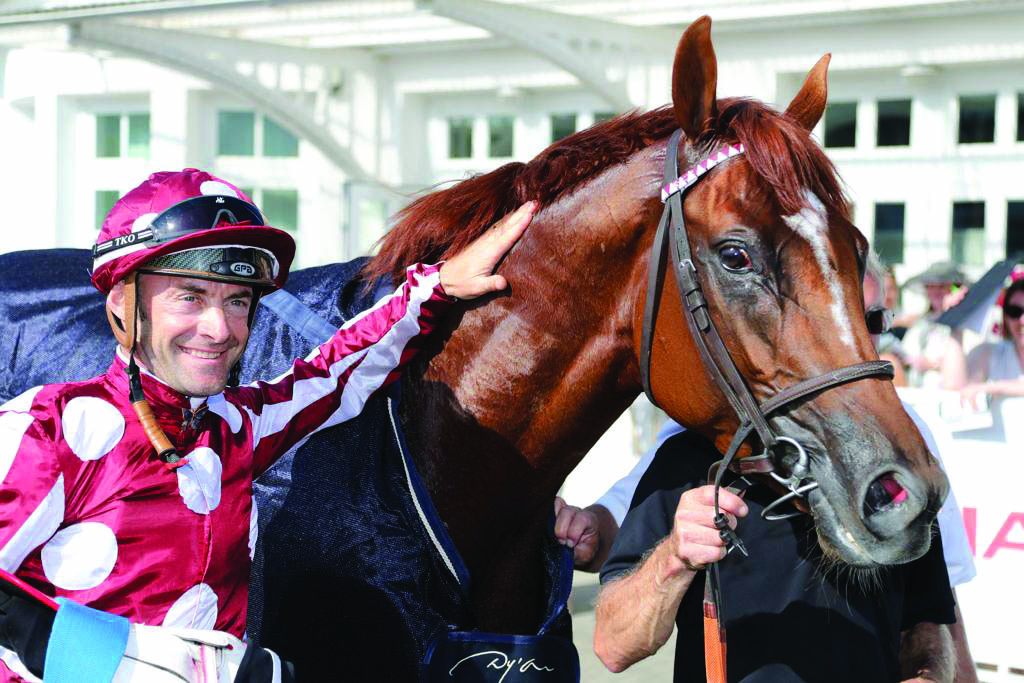 Jockey Olivier Peslier, who guided French King to victory in Hamburg poses for a picture on Sunday.