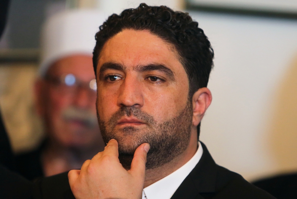 Saleh al-Gharib, state minister for refugee affairs, whose two bodyguards were killed yesterday in what he termed an attempted assassination, attends a news conference for Talal Arslan, Druze politician, in Khaldeh, near Beirut, Lebanon July 1, 2019. REUT