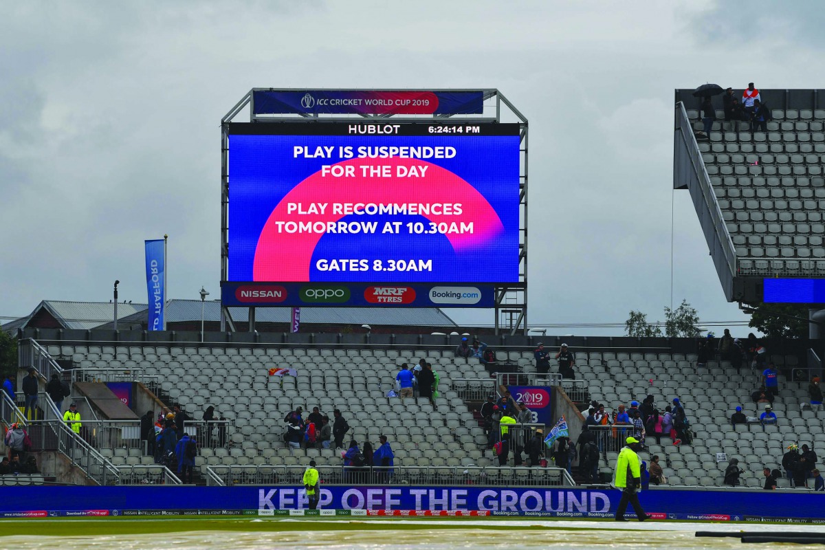 Information board tells that play has been suspsnded for the day in the 2019 Cricket World Cup first semi-final between India and New Zealand at Old Trafford in Manchester, northwest England, on July 9, 2019. AFP / Paul Ellis