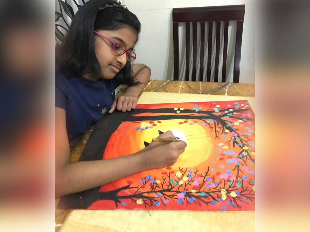 Serah working on one of her nature paintings. 