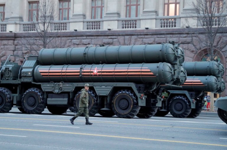 FILE PHOTO: A Russian serviceman walks past S-400 missile air defence systems before a parade marking the anniversary of the victory over Nazi Germany in World War Two, in central Moscow, Russia April 29, 2019. REUTERS/Tatyana Makeyeva
