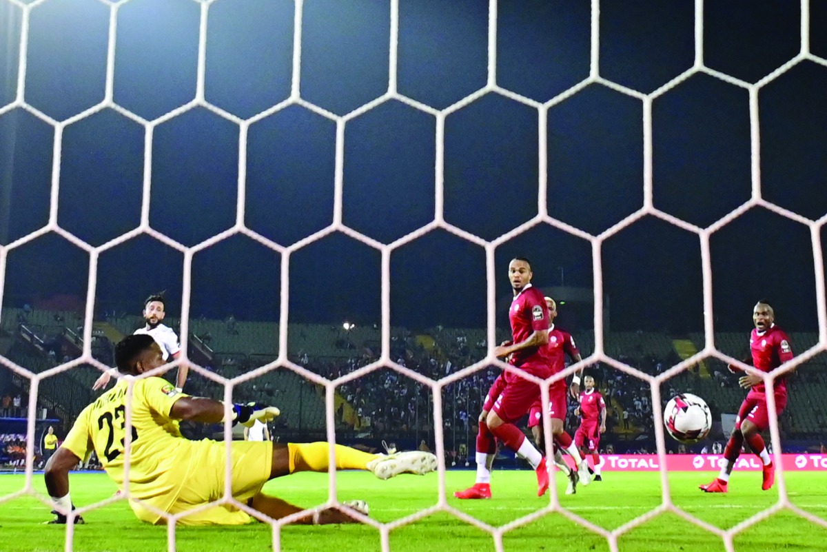 Tunisia's midfielder Youssef Msakni (1st-L) scores a goal during the 2019 Africa Cup of Nations (CAN) quarter final football match between Madagascar and Tunisia at the Al Salam stadium in Cairo on July 11, 2019 AFP / Javier Soriano