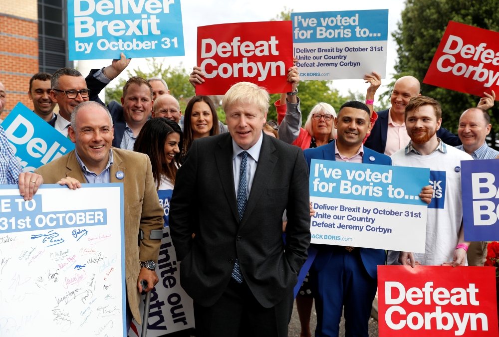 Boris Johnson, a leadership candidate for Britain's Conservative Party, arrives to attend a hustings event in Colchester, Britain July 13, 2019. REUTERS/Peter Nicholls
