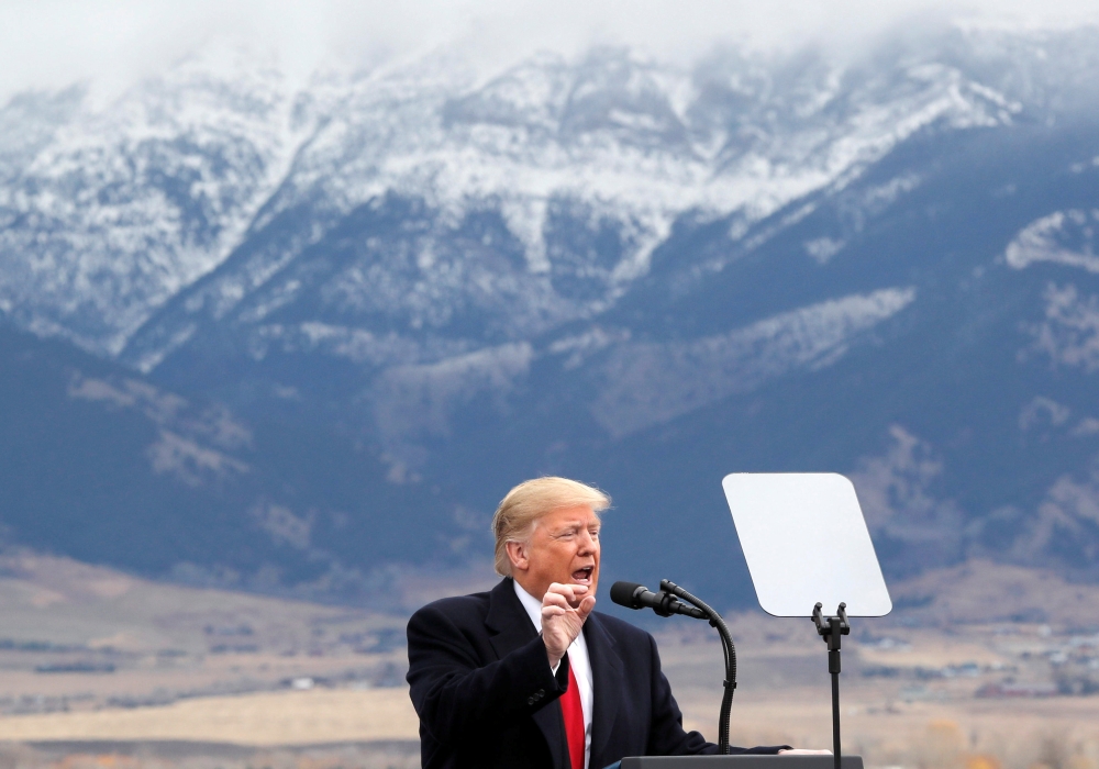 Donald Trump speaks during campaign rally for Matt Rosendale at Bozeman, Yellowstone International Airport in Montana, November 3, 2018. Reuters/Carlos Barria