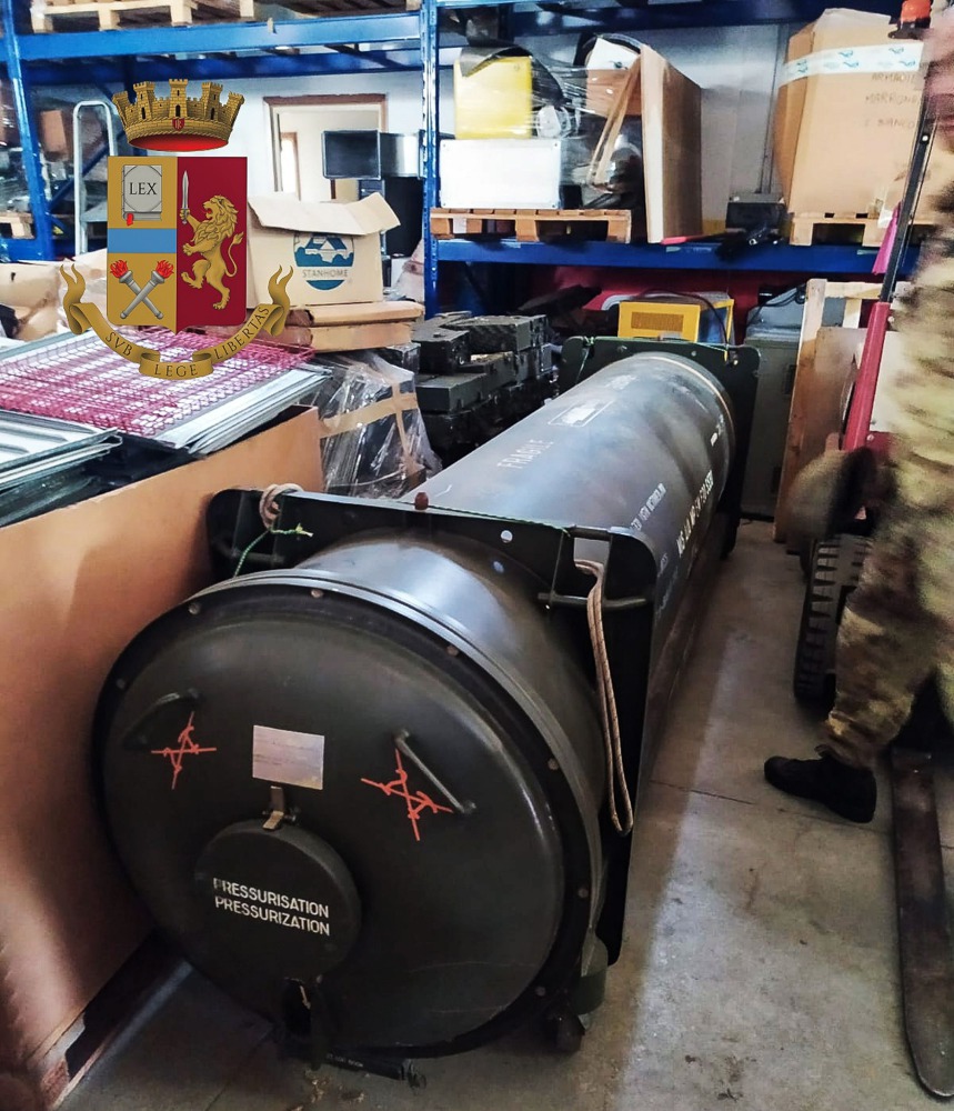 Italian Police handout shows weapons, including an air-to-air missile, that they say they seized in raids on neo-Nazi sympathisers, in Turin, Italy July 15, 2019. Polizia di Stato/ via Reuters