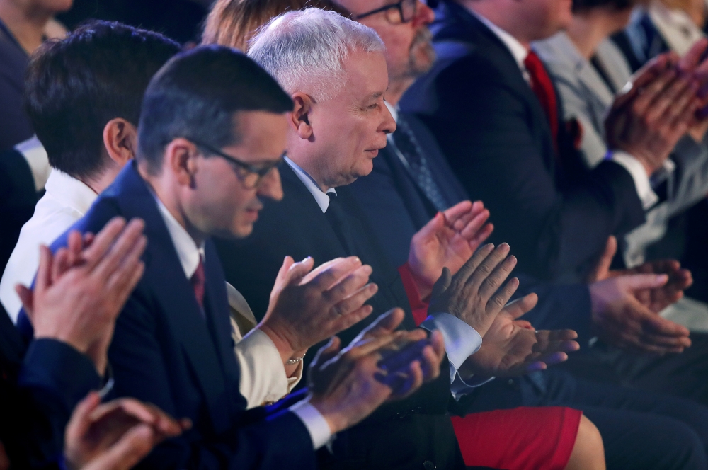 Poland's Law and Justice (PiS) leader Jaroslaw Kaczynski and Poland's Prime Minister Mateusz Morawiecki applaud as they attend a Law and Justice (PiS) party convention ahead of the EU election, in Krakow, Poland May 19, 2019. Reuters/Kacper Pempel