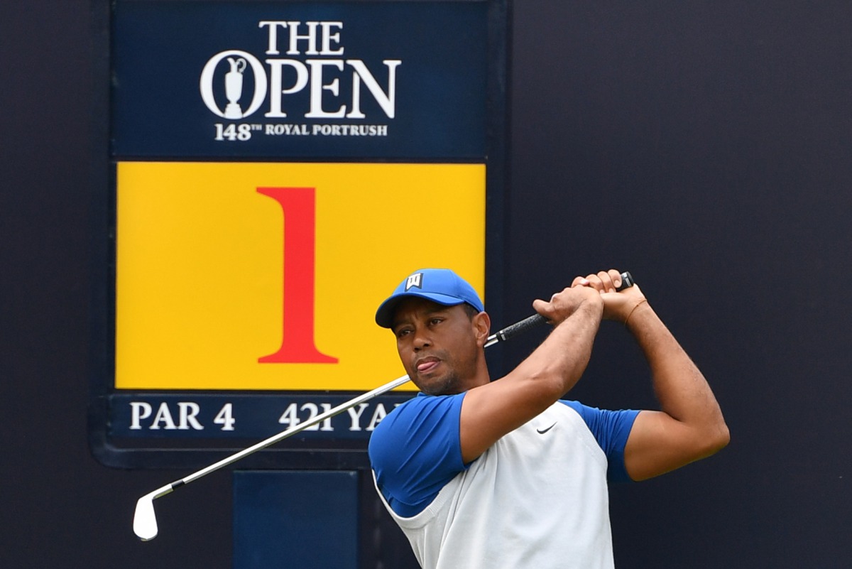 US golfer Tiger Woods prepares to tee off from the first hole during the first round of the British Open golf Championships at Royal Portrush golf club in Northern Ireland on July 18, 2019. AFP / Paul Ellis 
