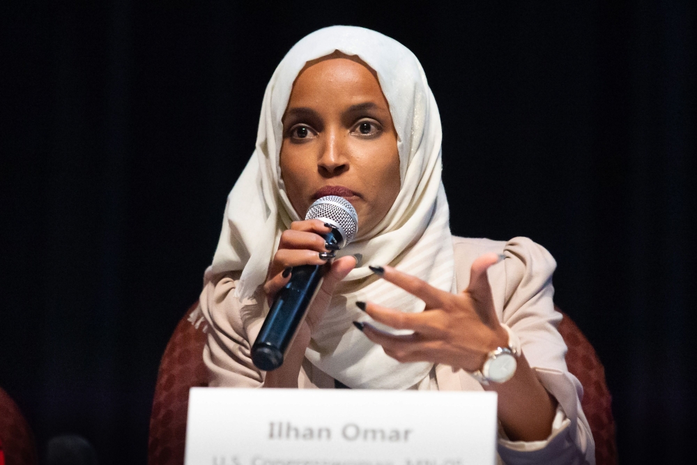 US Representative Ilhan Omar (D-MN) speaks on stage during a town hall meeting at Sabathani Community in Minneapolis, Minnesota on July 18, 2019. AFP / Kerem Yucel 