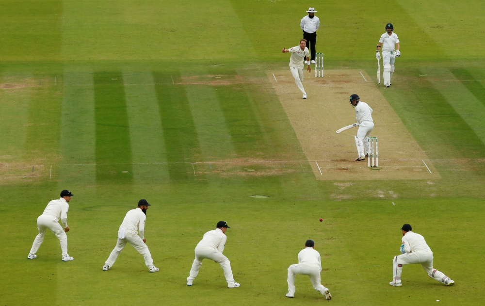 England's Joe Root takes the catch to dismiss Ireland's Andy McBrine off the bowling of England's Stuart Broad. (Reuters/Andrew Boyers)