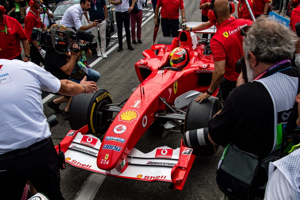 Mick Schumacher, son of former F1 champion, steers his father's championship winning Ferrari F2004 during a demonstration ahead of the German Formula One Grand Prix at the Hockenheim racing circuit on July 27, 2019 in Hockenheim, southern Germany. (AFP / 