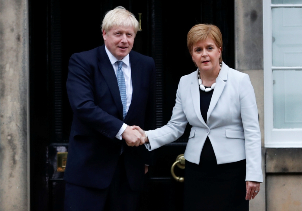 Britain's Prime Minister Boris Johnson shakes hands with Scotland's First Minister Nicola Sturgeon at Bute House in Edinburgh, Scotland, Britain July 29, 2019. (REUTERS/Russell Cheyne)