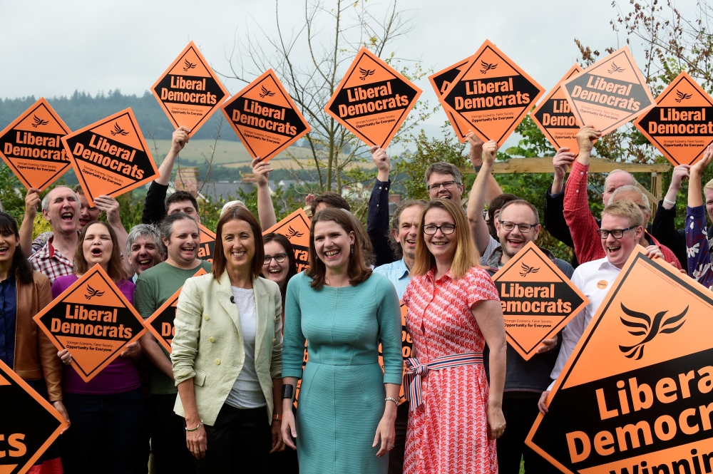 Jane Dodds celebrates winning the Brecon and Radnorshire by-election with Liberal Democrat leader Jo Swinson and Kirsty Williams AM in Brecon, Britain August 2, 2019. (REUTERS/Rebecca Naden)