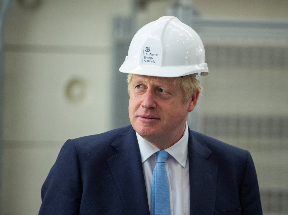 Britain's Prime Minister Boris Johnson visits the Fusion Energy Research Centre at the Fulham Science Centre in Oxfordshire, Britain August 8, 2019. (Julian Simmonds/Pool via REUTERS)