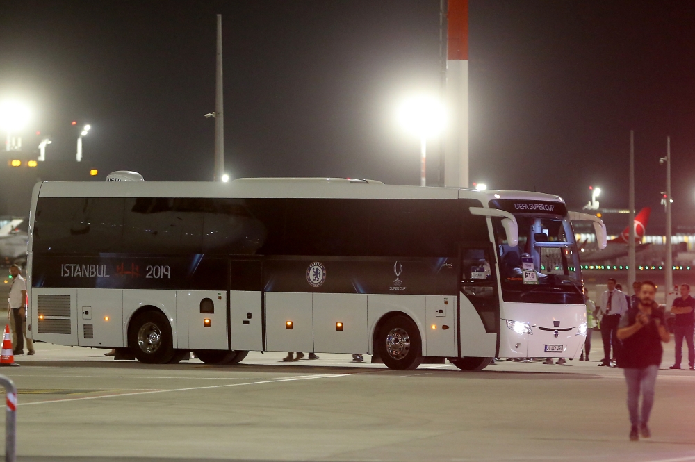 Football players and officials of Chelsea arrive at an airport ahead of the UEFA Super Cup soccer match between Liverpool and Chelsea, which will be on August 14, at Vodafone Park in Istanbul, Turkey on August 13, 2019. ( ?sa Terli - Anadolu 