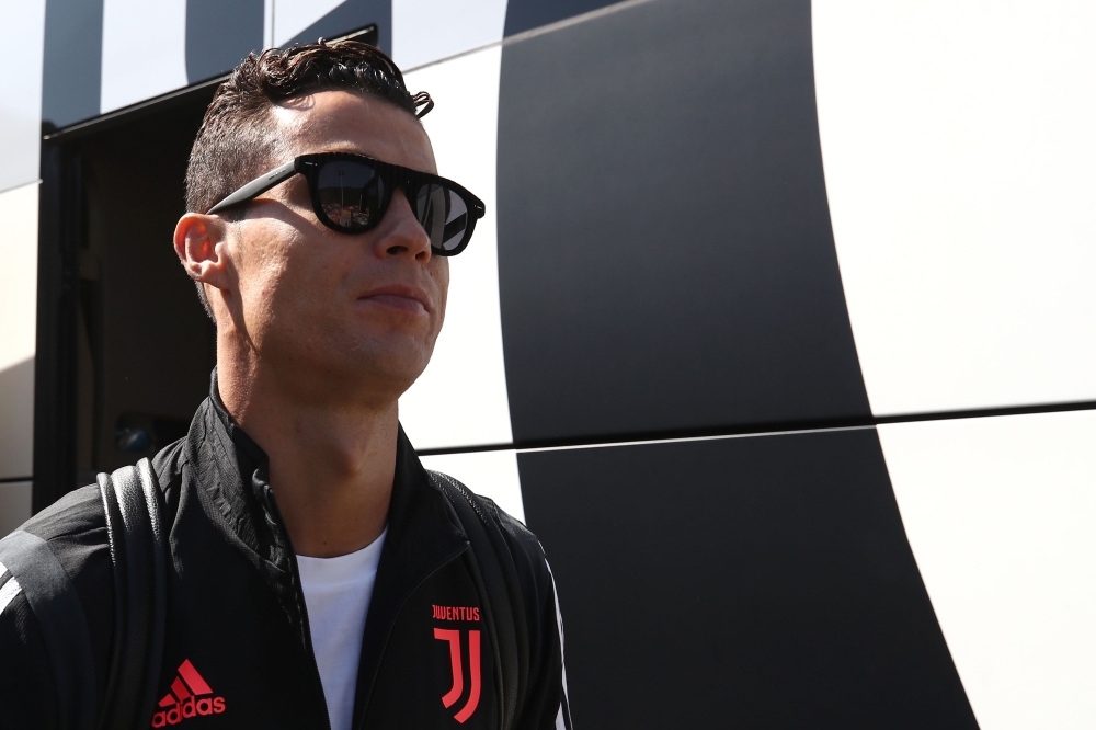 Juventus' Portuguese forward Cristiano Ronaldo arrives for the friendly football match between Juventus A and Juventus B in Villar Perosa, on August 14, 2019. / AFP / Isabella BONOTTO 