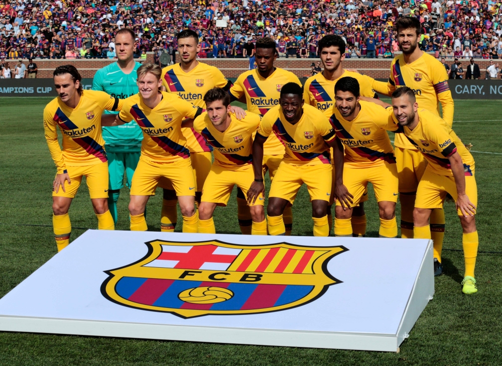 FC Barcelona's players pose before their La Liga-Serie A Cup match against SSC Napoli on August 10, 2019 at Michigan Stadium in Ann Arbor, Michigan. / AFP / JEFF KOWALSKY