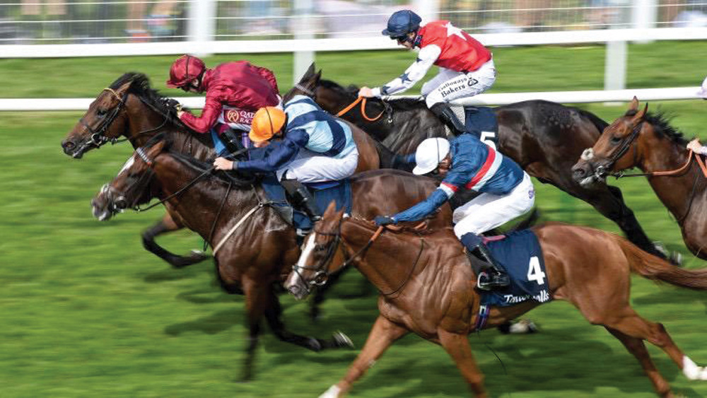 Oisin Murphy (top left) riding Kick On  to win The Tattersalls Sovereign Stakes at Salisbury Racecourse in Salisbury, England, on Thursday.