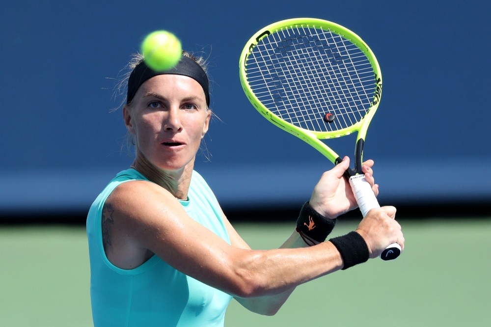Svetlana Kuznetsova of Russia returns a shot to Ashleigh Barty of Australia during Day 8 of the Western and Southern Open at Lindner Family Tennis Center on August 17, 2019 in Mason, Ohio. (Rob Carr/Getty Images/AFP)