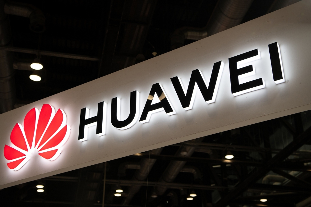 FILE PHOTO: Huawei logo is seen during the Consumer Electronics Expo in Beijing.  AFP / FRED DUFOUR

