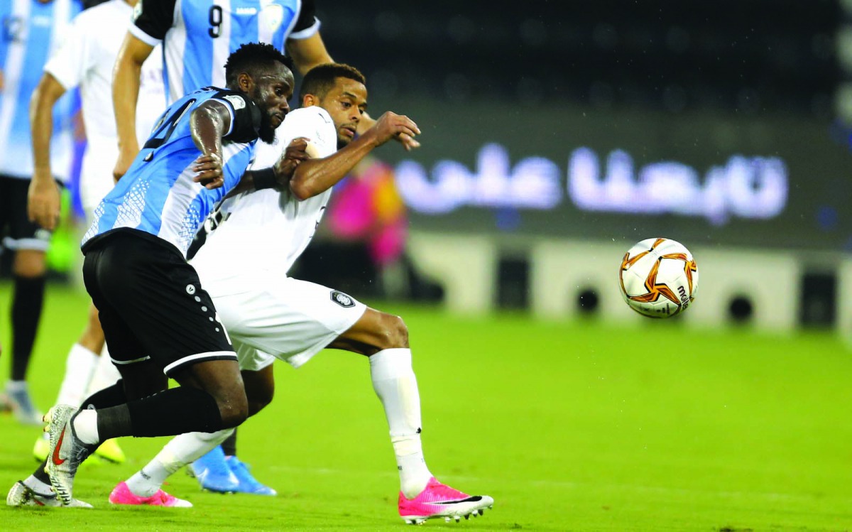 The players of Al Sadd and Al Wakrah vie for ball possession during their QNB Stars League match at the Al Sadd Stadium yesterday. 