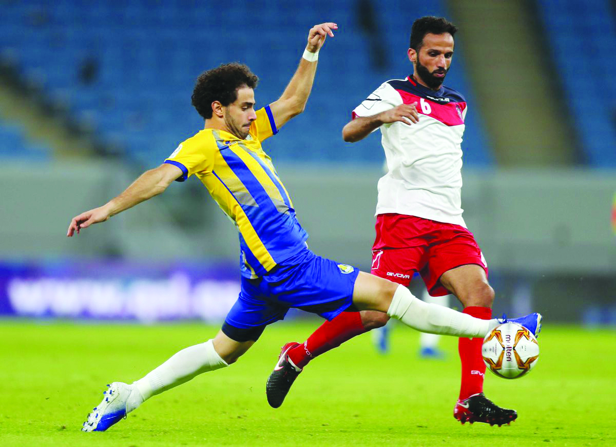 Al Gharafa’s Ahmed Alaaeldin (left) in action against Al Shahania captain Mostafa Jalal Jafri during their opening match of the QNB Stars League at Al Janoub Stadium yesterday. Picture: Twitter/ 
@alkasschannel 