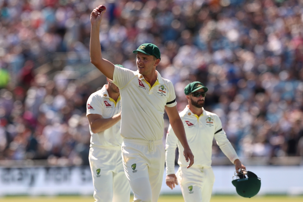  Australia's Josh Hazlewood holds up the ball at the end of England's 1st innings (Reuters/Lee Smith)
