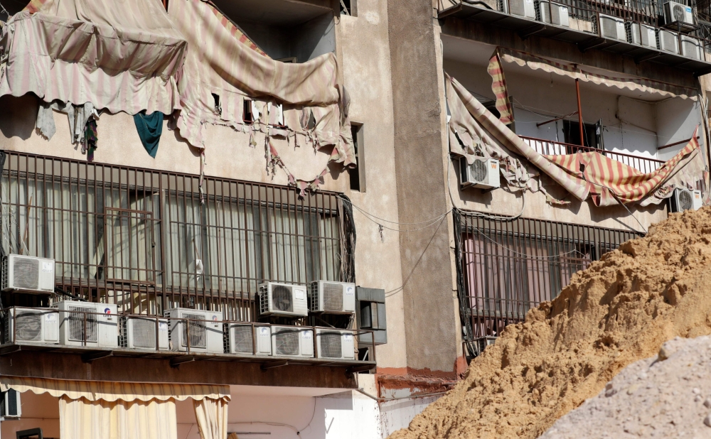 This picture taken on August 25, 2019, shows damage to a building housing a media centre of the Lebanese Shiite group Hezbollah in the south of the capital Beirut, after two drones came down in its vicinity earlier in the day. AFP / ANWAR AMRO