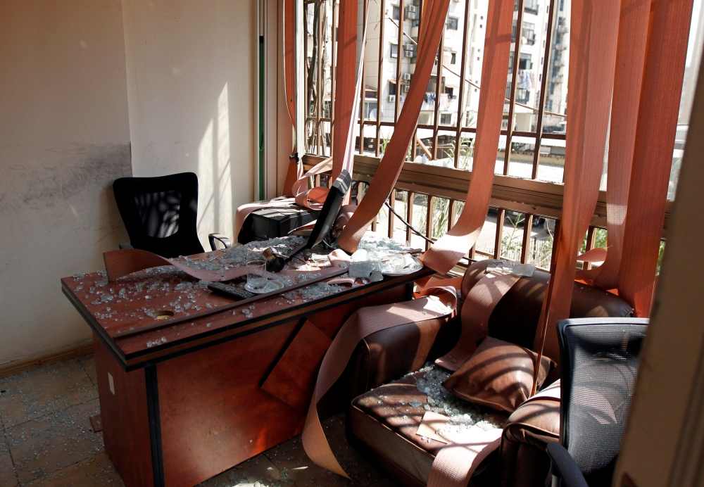 Damage and glass from broken windows is seen inside Hezbollah media center after an Israeli drone fell in the Hezbollah-dominated southern suburbs and a second one exploded near the ground in Dahiyeh suburbs of Beirut, Lebanon August 25, 2019. REUTERS/Moh