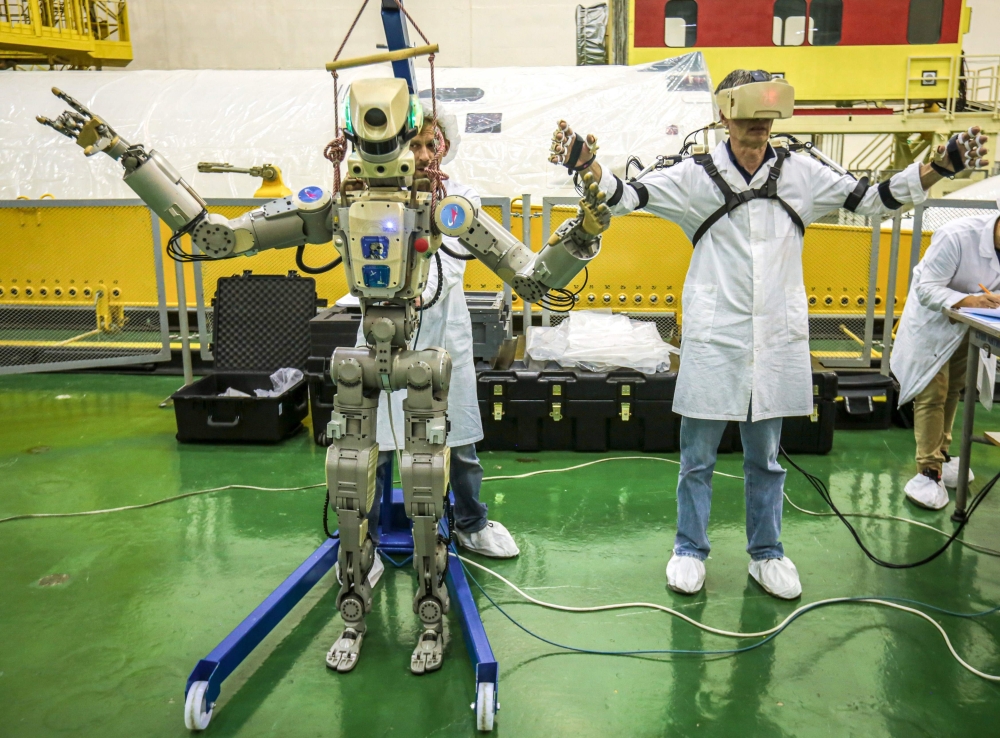 This handout picture taken on July 26, 2019 and released by the official website of the Russian State Space Corporation ROSCOSMOS on August 21, 2019 shows Russian humanoid robot Skybot F-850 (Fedor) being tested ahead of its flight on board Soyuz MS-14 sp