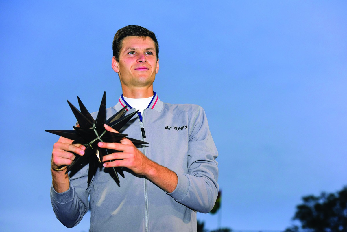 Hubert Hurkacz of Poland poses with the trophy after defeating Benoit Paire of France in the men's singles championship final on day eight of the Winston-Salem Open at Wake Forest University on August 24, 2019 in Winston Salem, North Carolina. Jared C. Ti