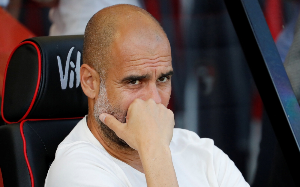 Manchester City manager Pep Guardiola before the match. REUTERS/Russell Cheyne