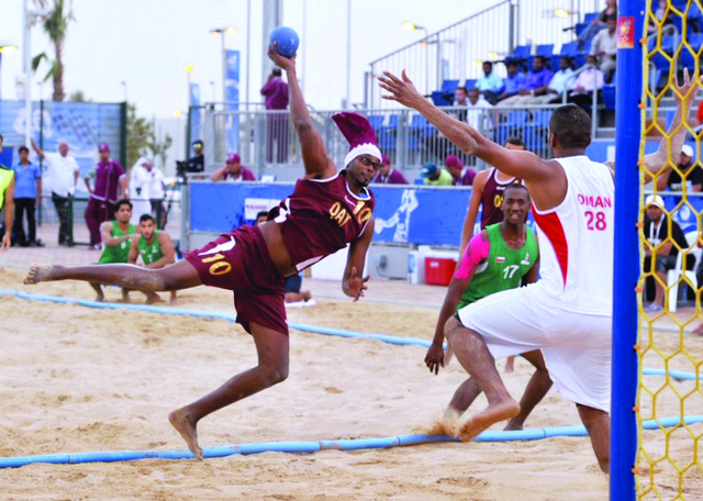 A Qatari beach handball player in action in this file photo.