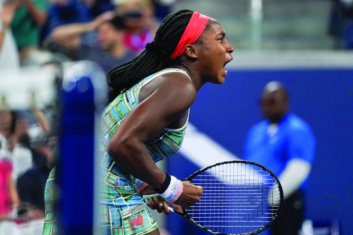 Coco Gauff of the US reacts after scoring a game point against Timea Babos of Hungary during their Round Two Women's Singles tennis match of the 2019 US Open at the USTA Billie Jean King National Tennis Center in New York on August 29, 2019. / AFP / Domin