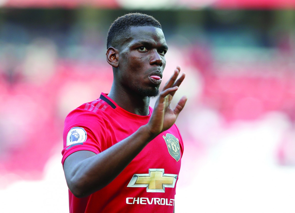 Manchester United's Paul Pogba looks dejected after a match. Reuters/Andrew Yates