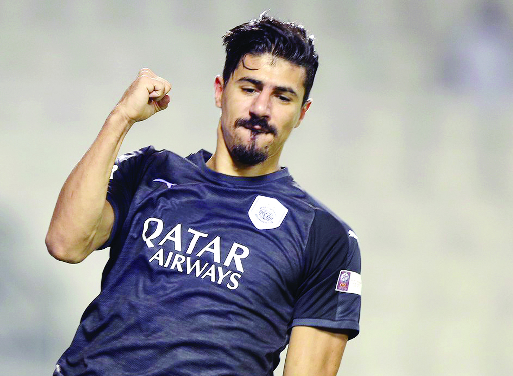 Al Sadd’s Baghdad Bounedjah celebrates after scoring a goal against Al Shahania in the QNB Stars League match at Al Sadd Stadium yesterday.
