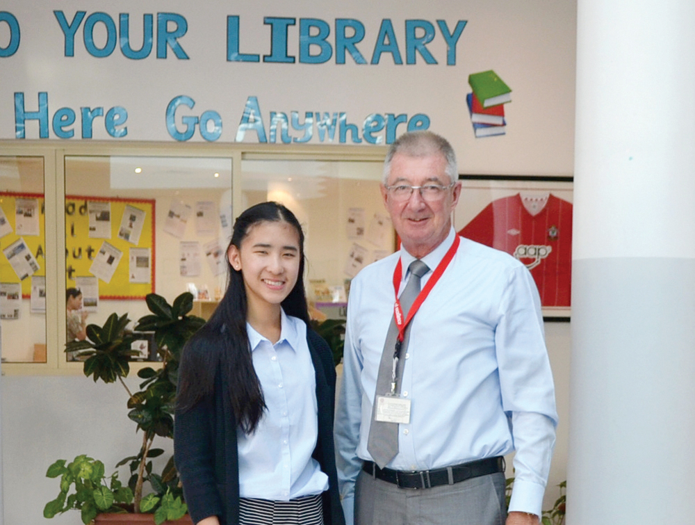The Principal of Doha British School, Terry McGuire, with student Natalie Magness. 