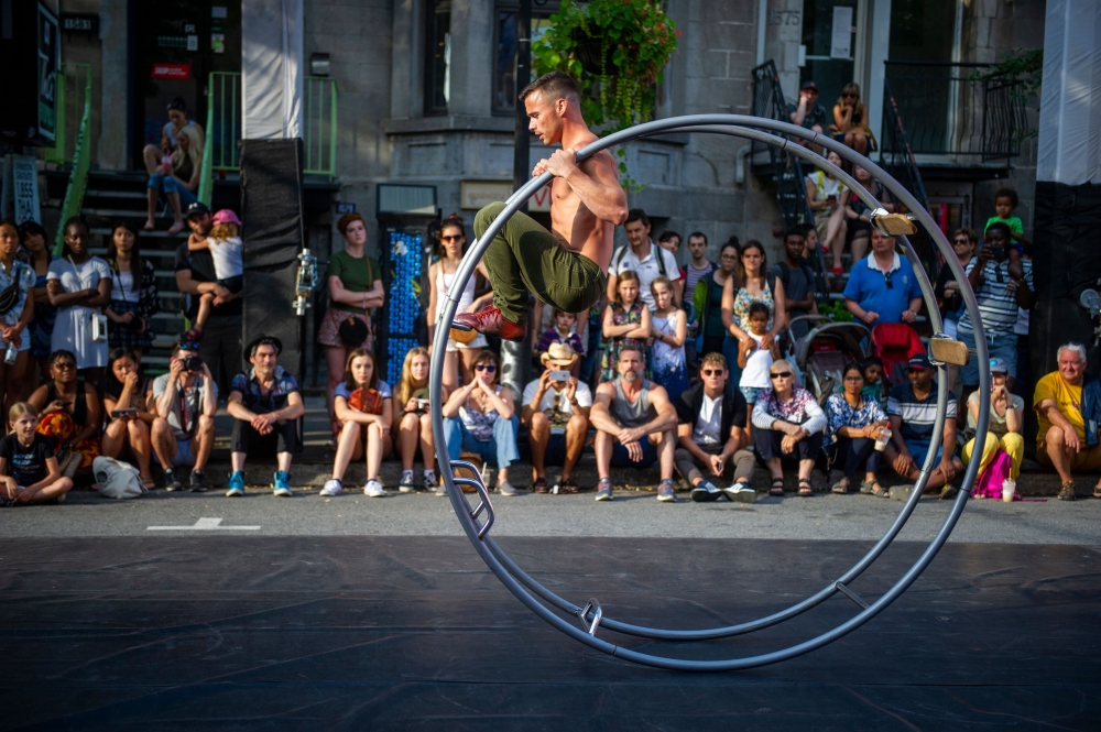 The crowd watches as people perform during 