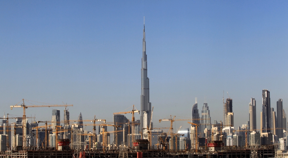 General view of Dubai's cranes at a construction site in Dubai, UAE December 18, 2018. Reuters/Satish Kumar