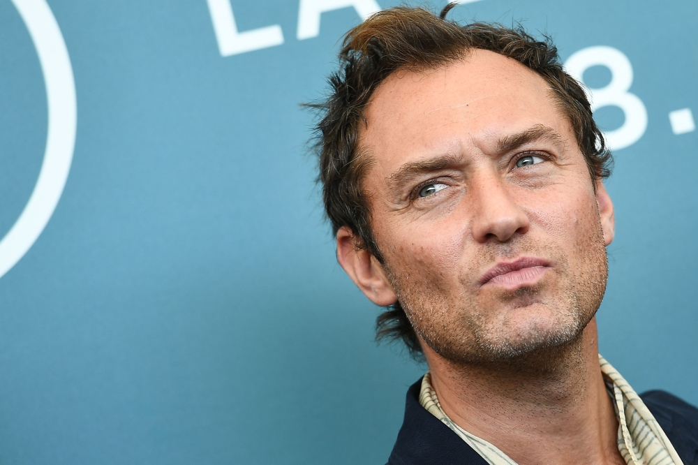 British actor Jude Law attends a photocall for the upcoming television series 