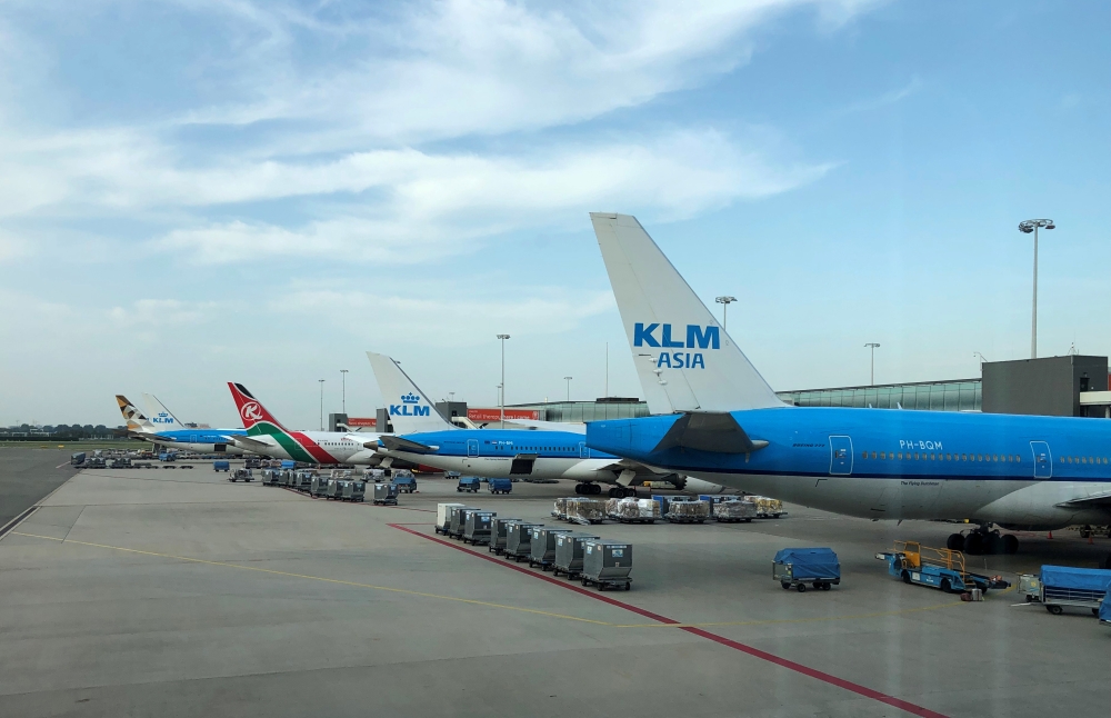 File phoyo of aircrafts are seen on the tarmac at Amsterdam Schiphol airport during an outage at the airport's main fuel supplier that kept dozens of flights on the ground, in Amsterdam, Netherlands July 24, 2019. REUTERS/Anthony Deutsch/File Photo
 