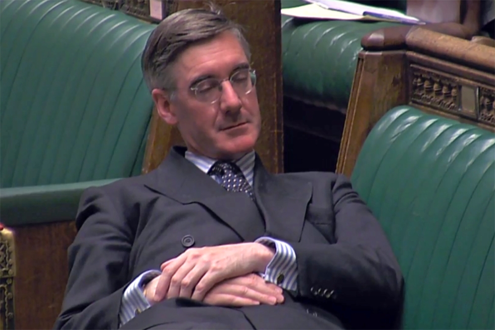 A video grab from footage broadcast by the UK Parliament's Parliamentary Recording Unit (PRU) shows Britain's Leader of the House of Commons Jacob Rees-Mogg relaxing during the Standing Order 24 emergency debate on a no-deal Brexit in the House of Commons
