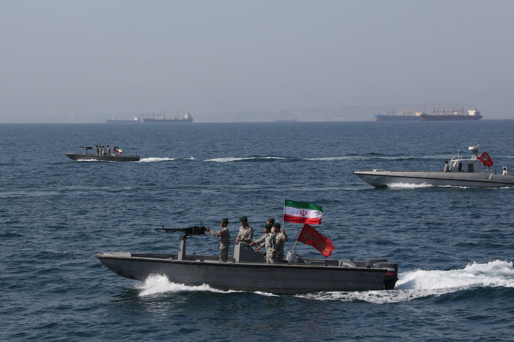 In this file photo taken on April 30, 2019 Iranian soldiers take part in the National Persian Gulf day in the Strait of Hormuz. AFP/Atta Kenare