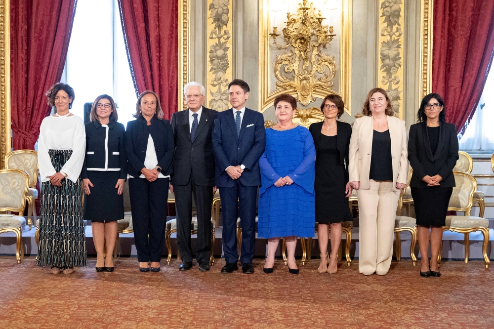 President Sergio Mattarella and Prime Minister Giuseppe Conte stand with newly sworn-in female cabinet ministers at the Quirinal Palace in Rome, Italy, September 5, 2019. Francesco Ammendola/Presidential Palace/via Reuters