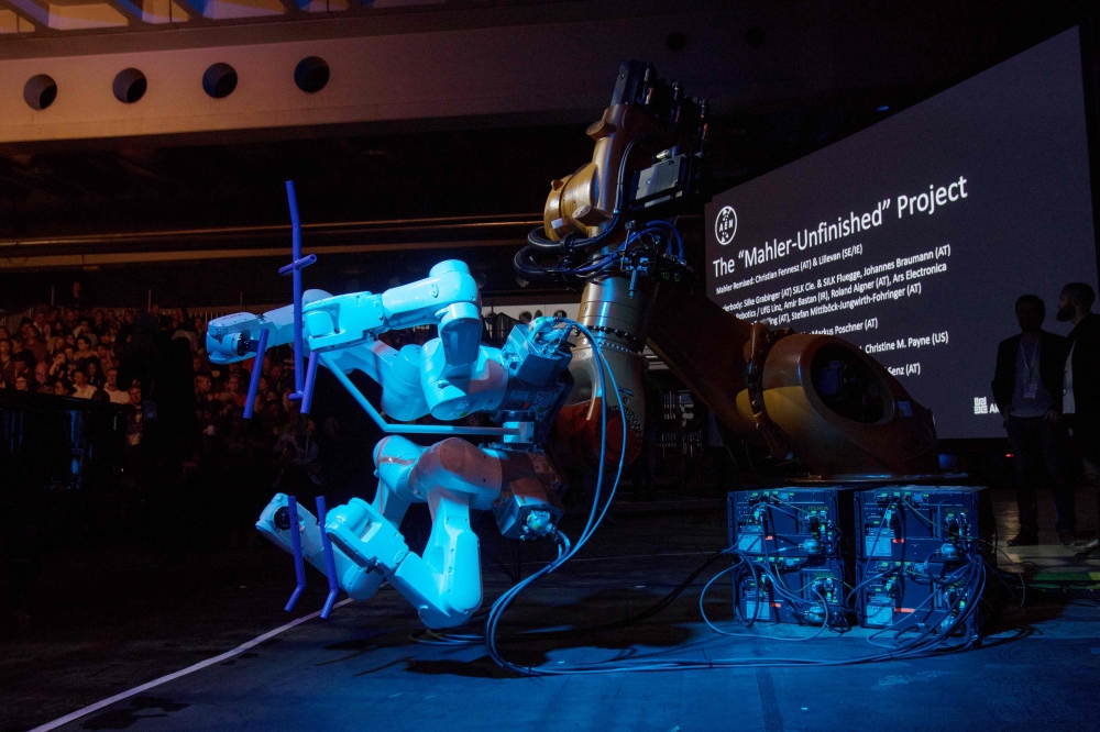 A robot stands on stage during the 