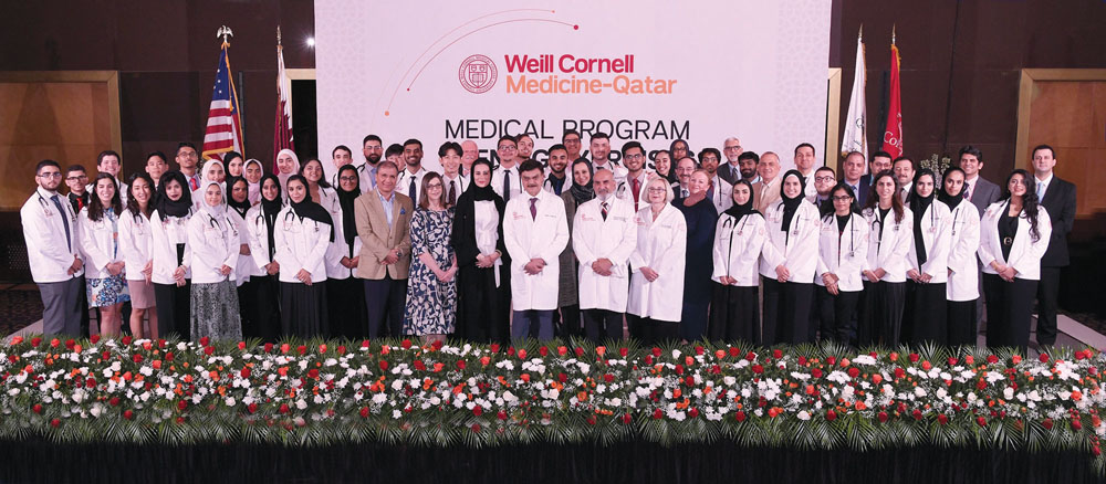 Weill Cornell Medicine–Qatar’s Class of 2023, with Dr. Javaid Sheikh, Dean of WCM-Q (centre), and other faculty members during the White Coat Ceremony 
held on Thursday.