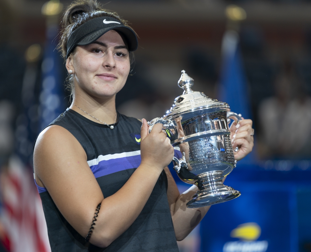 Bianca Andreescu of Canada poses with the trophy after her US Open Championships women's singles final match against Serena Williams (not seen) of USA at Billie Jean King National Tennis Center in New York, United States on September 7, 2019. ( Lev Radin 