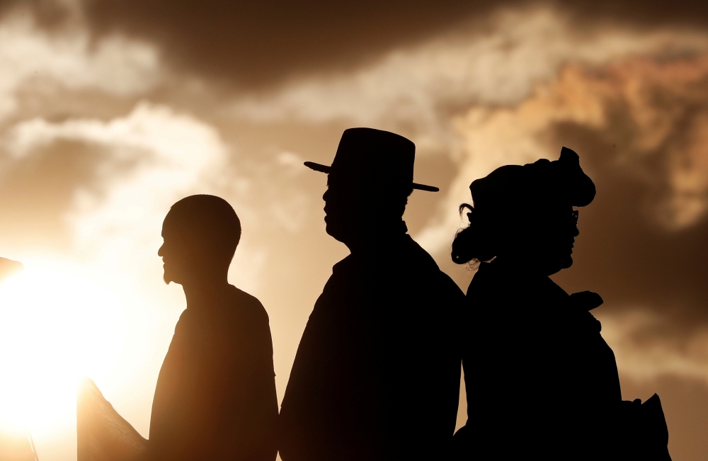 People are seen ahead of Pope Francis' arrival for a prayer vigil with youth at the Soamandrakizay Mess site in Antananarivo, Madagascar, September 7, 2019. Reuters/Yara Nardi