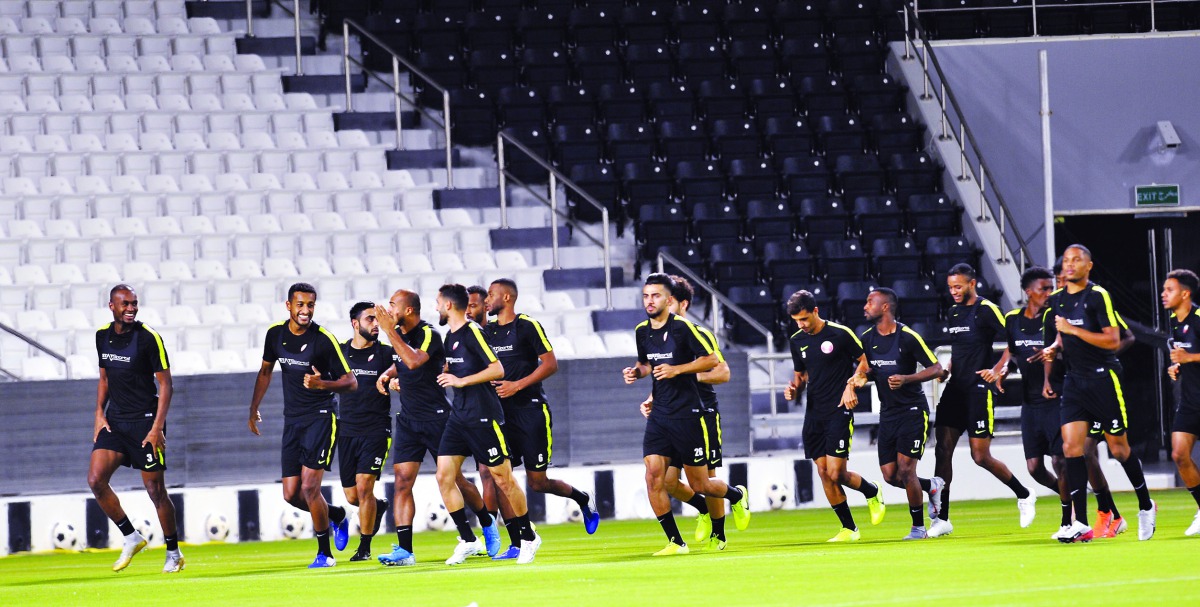 Qatari players taking part in a training session on the eve of their AFC Asian Cup China 2023 Qualification Round 2 match against India at the Al Sadd Stadium, yesterday. Picture by: Salim Matramkot/The Peninsula